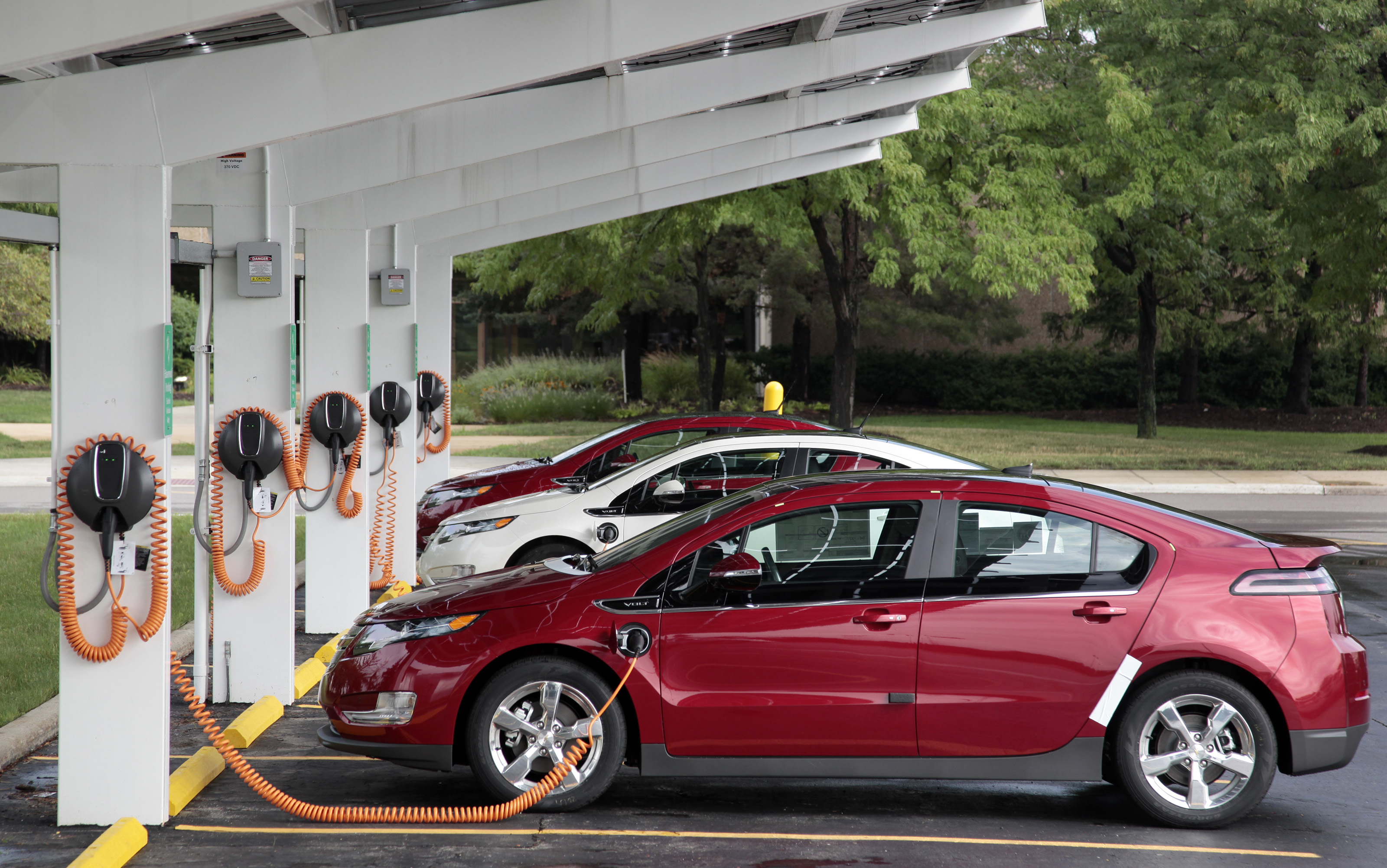 Chevrolet Volt electric vehicles are parked at solarpowered electric