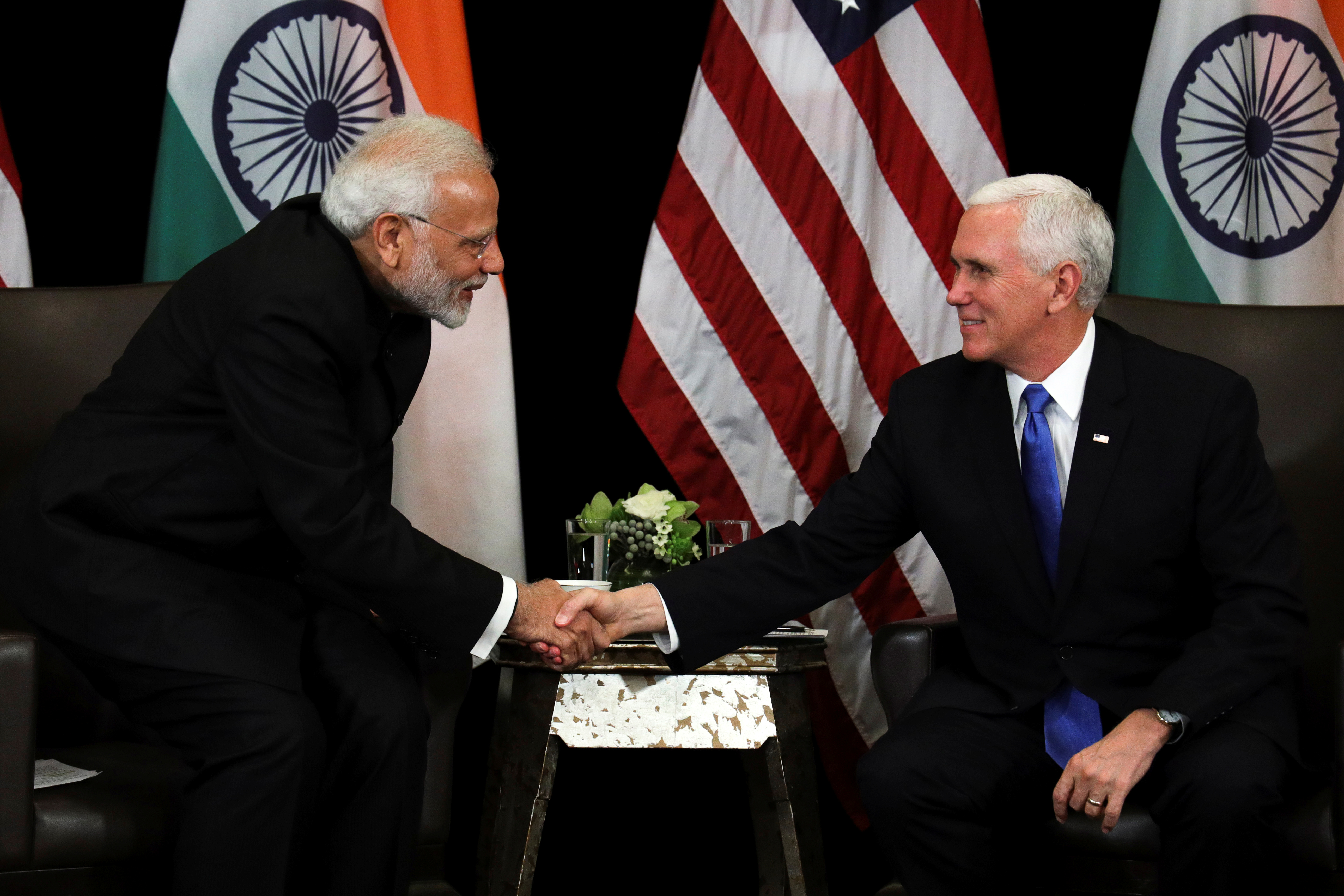 India's Prime Minister Narendra ModiÃŠshakes hand with U.S. Vice President Mike Pence during their bilateral meeting in Singapore, November 14, 2018. REUTERS/Athit Perawongmetha - RC1215088450